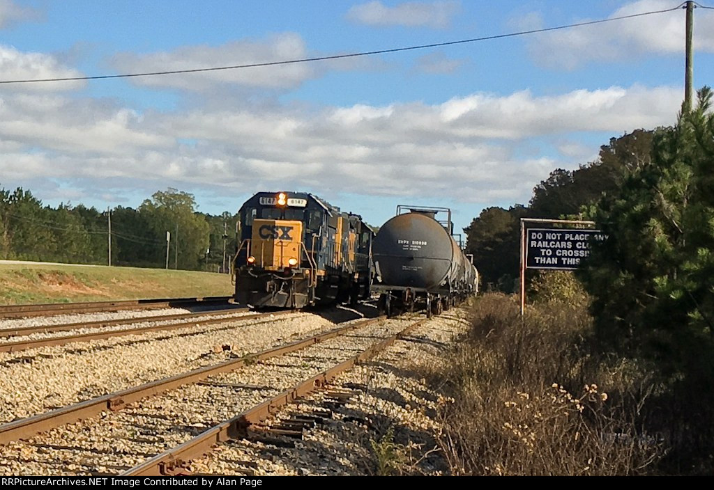 CSX 6147 and 2648 run light